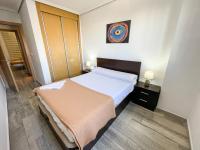 Posteľ alebo postele v izbe v ubytovaní Apartamentos Mirador del Castillo 3000