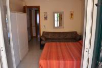 Posteľ alebo postele v izbe v ubytovaní Holiday House Naxos