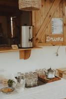 a table with glasses and a coffee pot on it at Dreamsea Imsouane Morocco in Imsouane
