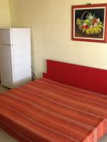 Posteľ alebo postele v izbe v ubytovaní Holiday House Naxos