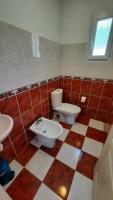 a bathroom with a toilet and a bidet at Villa La Folie Provencale in Lorgues