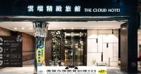 a building with a sign for the cloud hotel at The Cloud Hotel in Kaohsiung