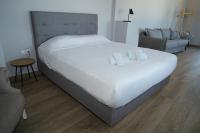 A bed or beds in a room at Ktima Faki, Olympus Mountain Accommodation & Retreat