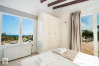 Postel nebo postele na pokoji v ubytování Villa Vista Mar by Abahana Villas