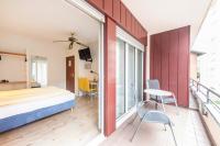 Hotel Atlantico self check-inにあるベッド