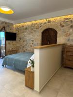 Posteľ alebo postele v izbe v ubytovaní Papanestoras Apartments