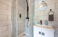 a bathroom with a shower and a sink at Amazing Apartment In Amblainville With Kitchenette in Amblainville