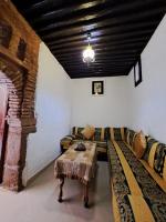 Postel nebo postele na pokoji v ubytování Dar Si hmed