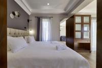 Posteľ alebo postele v izbe v ubytovaní Nival Luxury Suites
