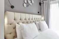 Posteľ alebo postele v izbe v ubytovaní Nival Luxury Suites
