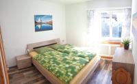 Postel nebo postele na pokoji v ubytování Haus St.Martin