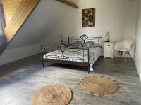 zest caraibes villa vue montagne tesisinde bir odada yatak veya yataklar