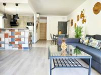 Posedenie v ubytovaní Apartamentos Las Palmeras