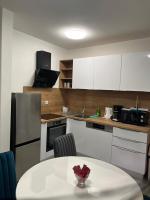 Kuchyňa alebo kuchynka v ubytovaní Apartments Puntamika