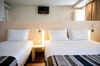 Park Hotel Porto Gaiaにあるベッド