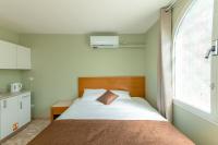 Ein Bett oder Betten in einem Zimmer der Unterkunft Villa Li Eilat