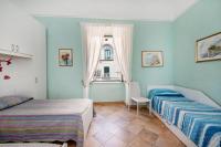Posteľ alebo postele v izbe v ubytovaní Casa Rosaria