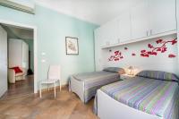 Posteľ alebo postele v izbe v ubytovaní Casa Rosaria