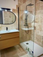 a bathroom with a shower and a sink at Villa Turquoise Sagone in Sagone