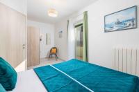 Postel nebo postele na pokoji v ubytování Two-Bedroom Apartment in Kraljevica I