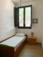 A bed or beds in a room at Casa tranquilla a pochissimi passi dal mare
