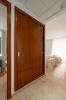 A bed or beds in a room at Hotel Santa Faz