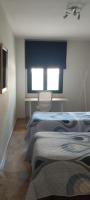 A bed or beds in a room at APARTAMENTO SAN PEDRO PLAYA