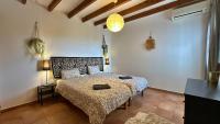 Posteľ alebo postele v izbe v ubytovaní Villa Málaga con Piscina Vallada, Barbacoa y hermosas vistas by AndaraHolidays