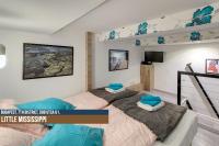Posteľ alebo postele v izbe v ubytovaní Little Americas Ring Apartments