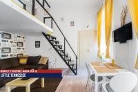 Televízia a/alebo spoločenská miestnosť v ubytovaní Little Americas Ring Apartments