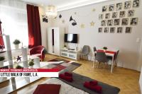 Televízia a/alebo spoločenská miestnosť v ubytovaní Little Americas Ring Apartments