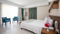 Postel nebo postele na pokoji v ubytování Dedeminn Marina Hotel