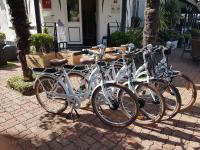 a row of bikes parked next to each other at Hotel Ty Gwenn La Baule in La Baule