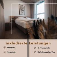 A bed or beds in a room at City Rooms Amstetten