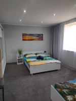 Posteľ alebo postele v izbe v ubytovaní Apartament U Bosmana