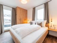 Posteľ alebo postele v izbe v ubytovaní Falken Suites TOP 5