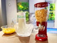 a red blender on a counter with a bowl of food at HOTEL SUI AKASAKA by ABEST in Tokyo