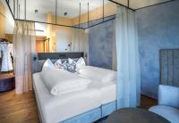 Postel nebo postele na pokoji v ubytování Hotel Schachner
