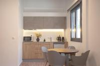 A kitchen or kitchenette at Aonia Luxurious Modern Boutique Apartments