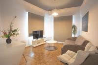 A television and/or entertainment centre at Aonia Luxurious Modern Boutique Apartments