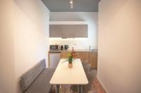 A kitchen or kitchenette at Aonia Luxurious Modern Boutique Apartments