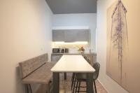 A kitchen or kitchenette at Aonia Luxurious Modern Boutique Apartments