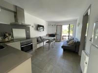 A kitchen or kitchenette at Acogedor apartamento con piscina comunitaria, cerca de la playa de Sa Tuna - ES-226-26