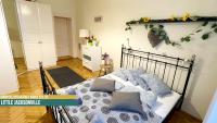 Posteľ alebo postele v izbe v ubytovaní Little Americas Music Academy Apartments