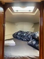 a room with two pillows on the floor of a boat at Nuit insolite dans un petit voilier in La Rochelle