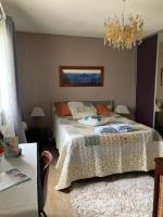 Posteľ alebo postele v izbe v ubytovaní Villa Rose Suite et chambres