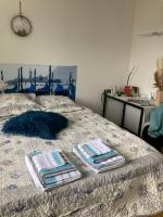 Posteľ alebo postele v izbe v ubytovaní Villa Rose Suite et chambres