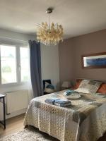 Posteľ alebo postele v izbe v ubytovaní Villa Rose Suite et chambres