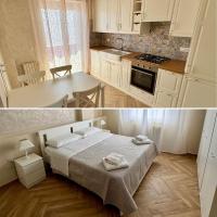 cocina y dormitorio con cama y mesa en Columbia House, en Palmi