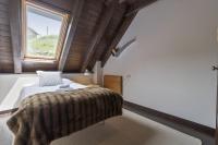 Postel nebo postele na pokoji v ubytování Luderna - Casa con terraza Unhola